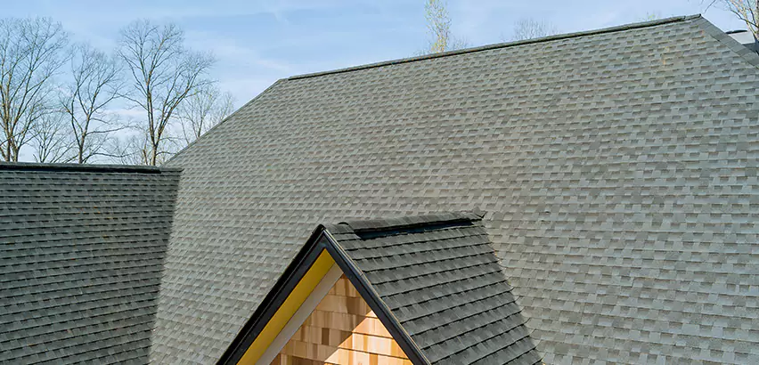 Replacing Vinyl Siding With Cedar Shingles in Bedford